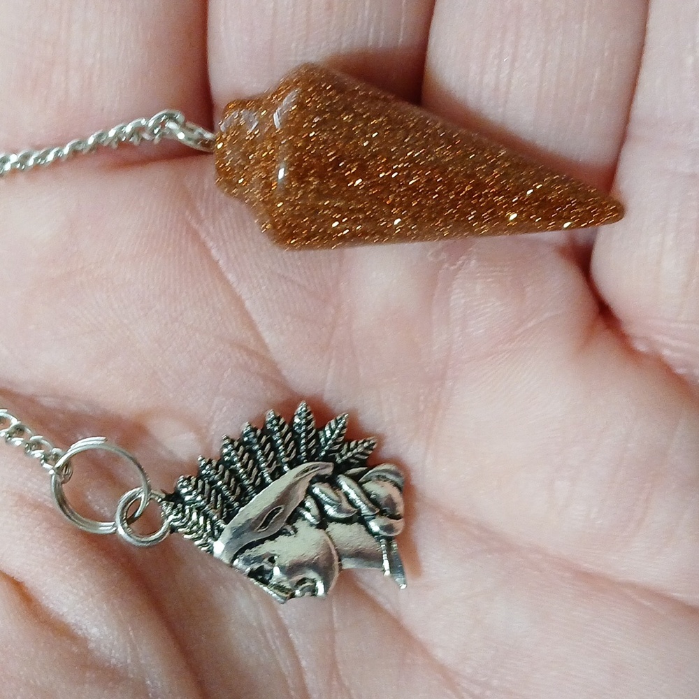 New Gold Sand Stone Pendulum and Silver Native American Pendant.